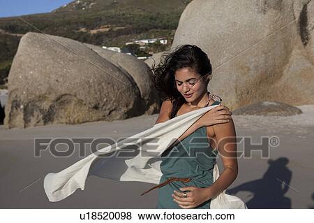 Girl holding scarf View Large Photo Image Stock Photo - Girl holding scarf. Fotosearch