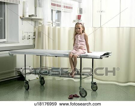 Girl in a hospital bed View Large Photo Image Stock Photo - Girl in a hospital bed. Fotosearch