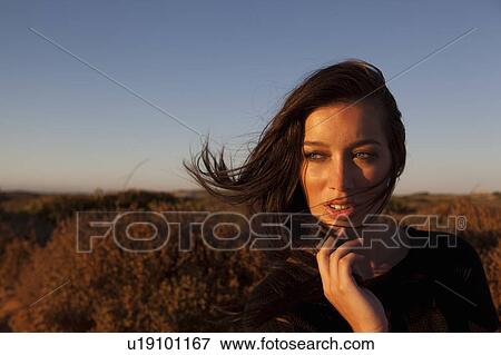Stock Photo - Girl in the sun. Fotosearch