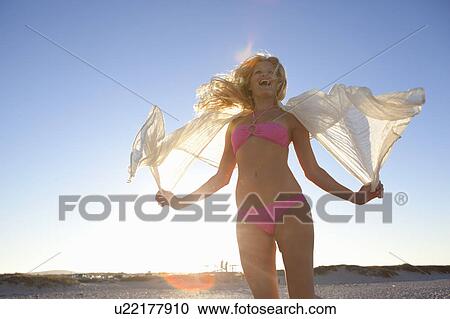 Stock Image - Girl jumping. Fotosearch