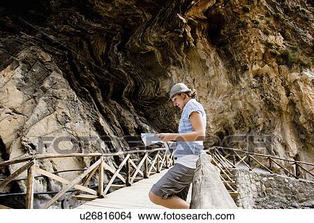 girl looking at map in canyon View Large Photo Image Picture - girl looking at map in canyon. Fotosearch