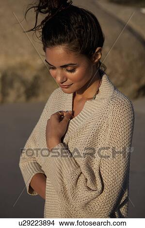 Picture - Girl looking down. Fotosearch