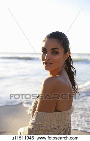 Stock Photograph - Girl looking in camera. Fotosearch