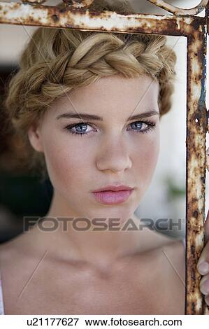 Stock Photo - Girl looking into camera. Fotosearch