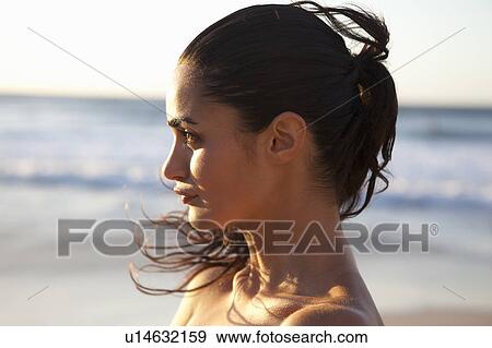 Stock Photo - Girl looking out. Fotosearch