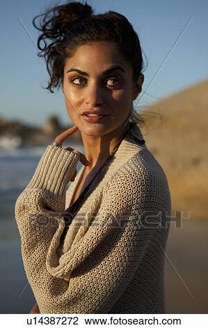 Stock Image - Girl looking to the side. Fotosearch