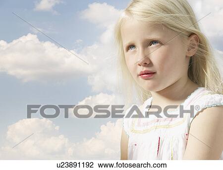 girl looking up with sky background View Large Photo Image Stock Image - girl looking up with sky background. Fotosearch