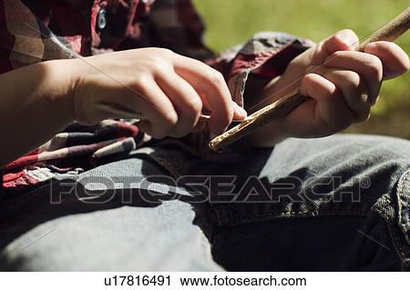 Girl playing with sticks View Large Photo Image Stock Image - Girl playing with sticks. Fotosearch