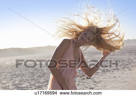 Girl shaking hair View Large Photo Image Picture - Girl shaking hair. Fotosearch