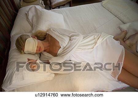 Girl sleeping with mask View Large Photo Image Stock Image - Girl sleeping with mask. Fotosearch