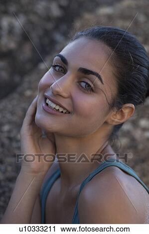 Stock Image - Girl smiling in camera. Fotosearch