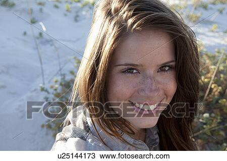 Girl smiling in camera View Large Photo Image Stock Image - Girl smiling in camera. Fotosearch