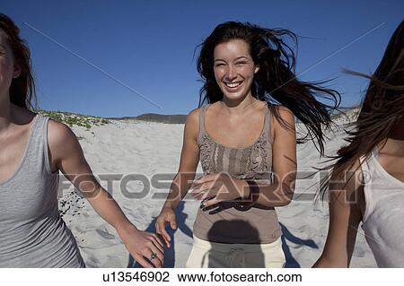 Stock Image - Girl smiling into camera. Fotosearch