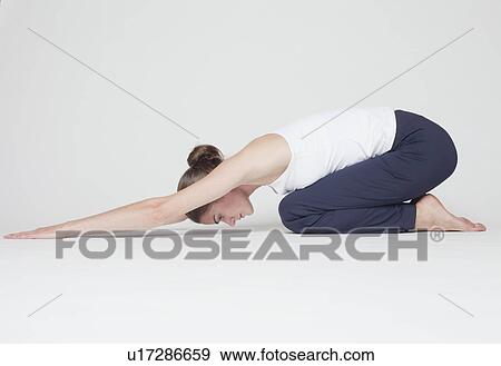 girl stretching on white background View Large Photo Image Stock Photo - girl stretching on white background. Fotosearch