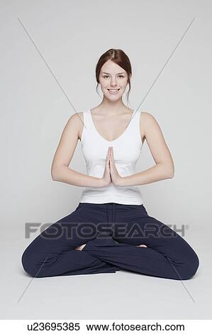 girl stretching on white background View Large Photo Image Stock Photography - girl stretching on white background. Fotosearch