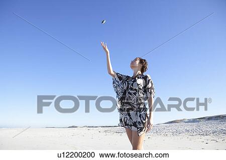 Girl throughing stone View Large Photo Image Stock Image - Girl throughing stone. Fotosearch