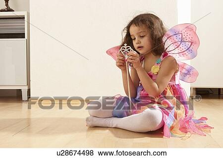 Girl with fairy wings View Large Photo Image Stock Photo - Girl with fairy wings. Fotosearch