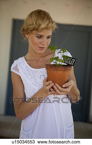 Girl with parsley View Large Photo Image Stock Image - Girl with parsley. Fotosearch