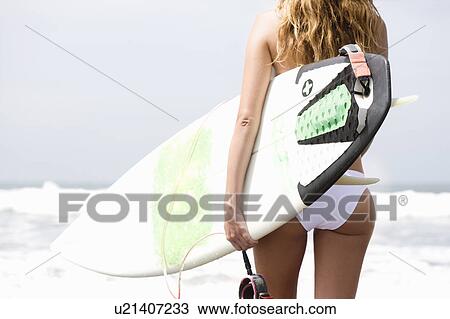 Girl with surfboard in bikini View Large Photo Image Stock Image - Girl with surfboard in bikini. Fotosearch