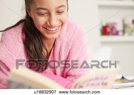 Stock Photo - girlfriends hanging out at home . Fotosearch