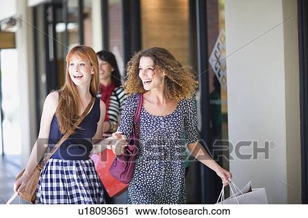 Girlfriends on shopping tour having fun View Large Photo Image Stock Image - Girlfriends on shopping tour having fun. Fotosearch