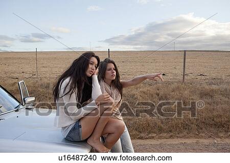 Girls getting direction View Large Photo Image Stock Image - Girls getting direction. Fotosearch