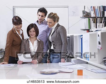 Stock Image - Group meeting in Architect office. Fotosearch