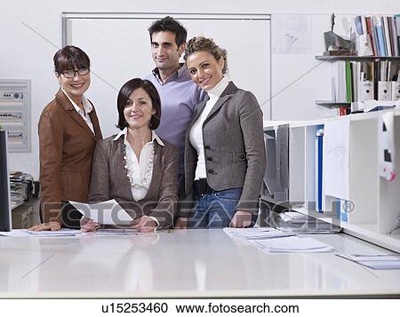 Stock Image - Group meeting in Architect office. Fotosearch