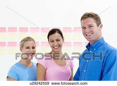Stock Photo - Happy business team. Fotosearch