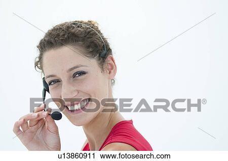 Happy woman with headset View Large Photo Image Stock Image - Happy woman with headset. Fotosearch