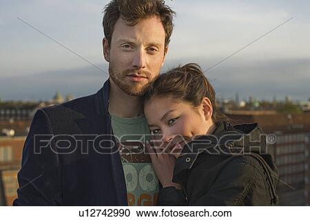 He gives her comfort and warmth View Large Photo Image Stock Image - He gives her comfort and warmth. Fotosearch