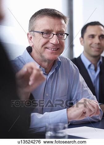 Individuals in group meeting View Large Photo Image Stock Photograph - Individuals in group meeting. Fotosearch