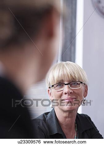 Individuals in group meeting View Large Photo Image Stock Photograph - Individuals in group meeting. Fotosearch