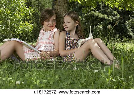 Stock Image - Kids in Garden. Fotosearch