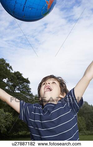 Stock Image - Kids in Garden. Fotosearch