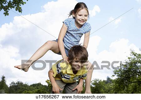 Stock Photo - Kids in Garden. Fotosearch