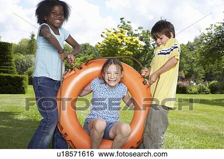 Kids in Garden View Large Photo Image Stock Photograph - Kids in Garden. Fotosearch