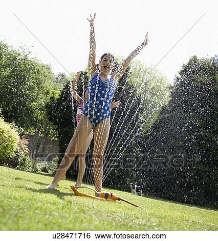 Stock Photograph - Kids in Garden. Fotosearch