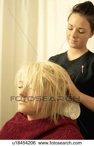 Stock Photograph - Lady having head massage. Fotosearch