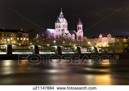 Lit church and bridge by river at night View Large Photo Image Picture - Lit church and bridge by river at night. Fotosearch