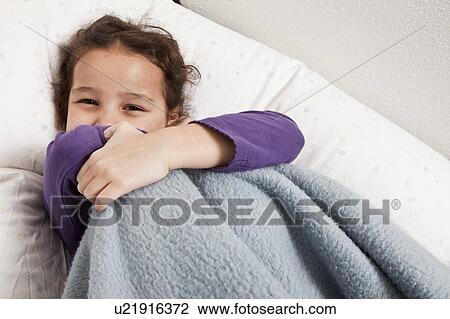 Little girl hiding behind blanket View Large Photo Image Stock Image - Little girl hiding behind blanket. Fotosearch