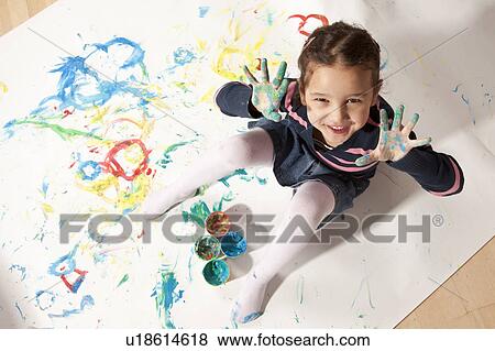 Little girl playing with finger paint View Large Photo Image Stock Photo - Little girl playing with finger paint. Fotosearch