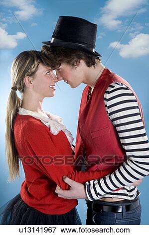 Loving couple wear red look together View Large Photo Image Stock Photo - Loving couple wear red look together. Fotosearch