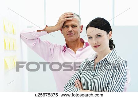 Male and female business colleagues View Large Photo Image Stock Photography - Male and female business colleagues. Fotosearch