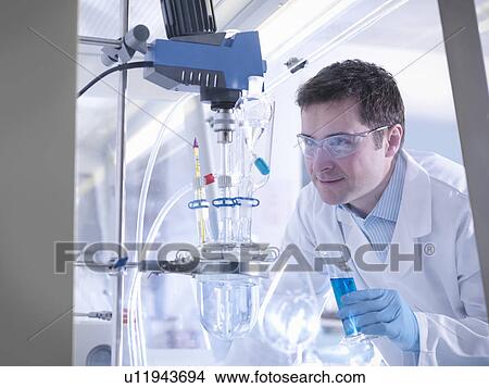 Picture - Male scientist in laboratory. Fotosearch