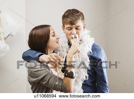Man drinks from girlfriend's glass View Large Photo Image Picture - Man drinks from girlfriend's glass. Fotosearch