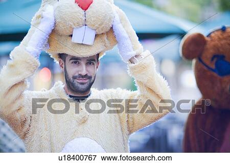 Man in a bunny costume View Large Photo Image Stock Photo - Man in a bunny costume. Fotosearch
