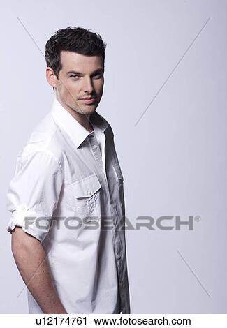 Man in studio View Large Photo Image Stock Image - Man in studio. Fotosearch