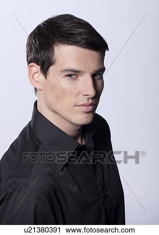 Stock Image - Man in studio. Fotosearch