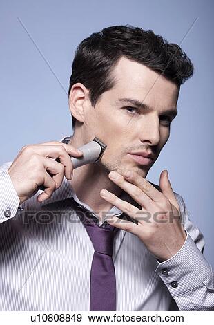 Stock Photo - Man in studio. Fotosearch
